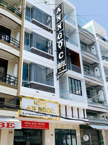 a hotel sign on the side of a building at AN NGỌC HOTEL in Can Tho
