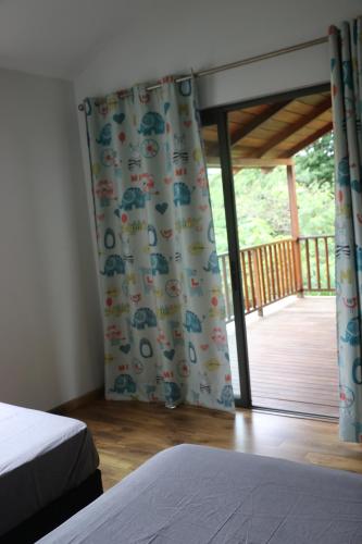 Postel nebo postele na pokoji v ubytování KEHA PROPERTIES