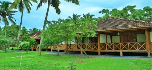 Jardín al aire libre en Estuary Sarovar Premiere Poovar Island