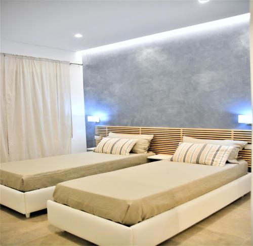 Llit o llits en una habitació de B&B La Piccola Perla - Sorrento Coast