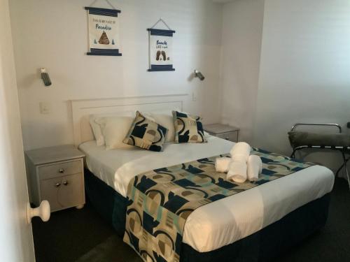 Postel nebo postele na pokoji v ubytování Ocean Courtyard - Beachside Unit