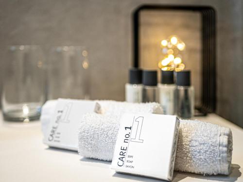 Кровать или кровати в номере TDYHOMES Hotel