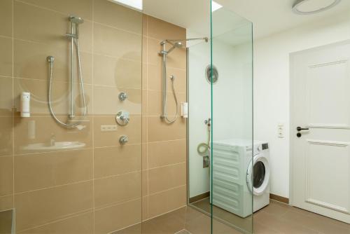 Ванная комната в ANA Living Augsburg City Center by Arthotel ANA - Self-Service-Hotel