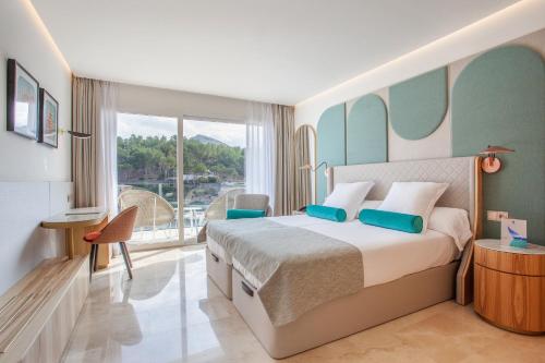 Postel nebo postele na pokoji v ubytování Grupotel Molins
