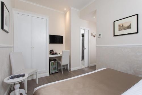 Μια τηλεόραση ή/και κέντρο ψυχαγωγίας στο Relais de l'Opera Suites