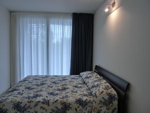 Postel nebo postele na pokoji v ubytování Residence Mimose