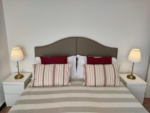 A bed or beds in a room at Bianca House Sea View