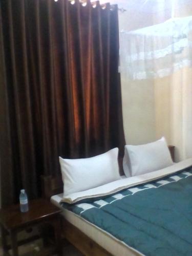 Ein Bett oder Betten in einem Zimmer der Unterkunft Dich Comfort Hotel University Branch