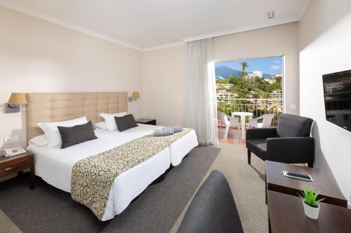 Postel nebo postele na pokoji v ubytování Hotel Atlantic El Tope