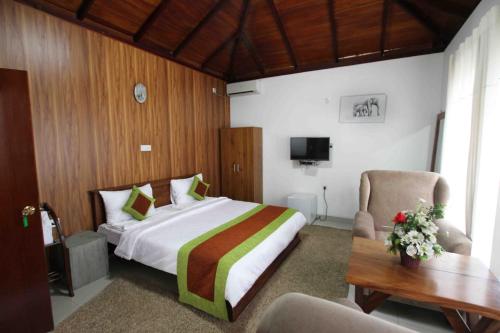 Postel nebo postele na pokoji v ubytování Kandy Dawson Bungalow