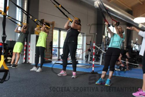a group of people in a gym with ropes at Casa a Colori Padova in Padova