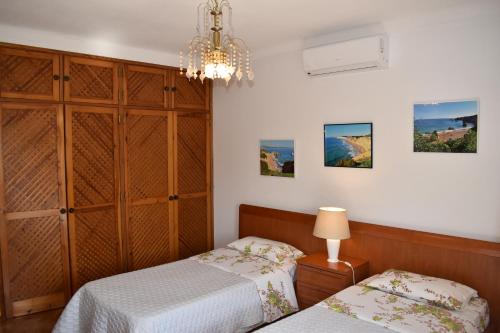 Postel nebo postele na pokoji v ubytování Monte da Ria Guest House