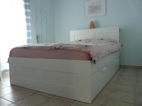 En eller flere senge i et værelse på Les Terrasses Vénitiennes