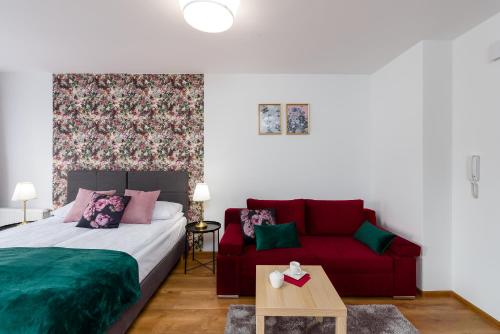 Ένα ή περισσότερα κρεβάτια σε δωμάτιο στο Sleepway Apartments - English Dream