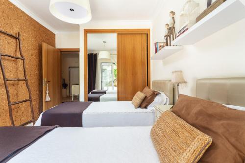 Ένα ή περισσότερα κρεβάτια σε δωμάτιο στο Decor n' cozy place for families and friends