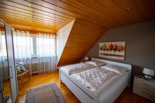 Säng eller sängar i ett rum på Studenik