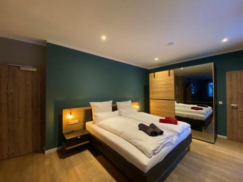 Letto o letti in una camera di Braunlage Lodge