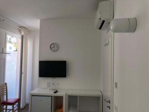 TV a/nebo společenská místnost v ubytování Aleksi rooms