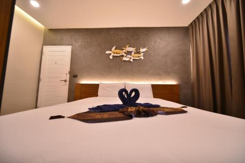 Postel nebo postele na pokoji v ubytování Sureena Hotel