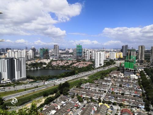 an aerial view of a city with a river and buildings at USJ One Premium Suites @Subang @Sunway @USJ in Subang Jaya