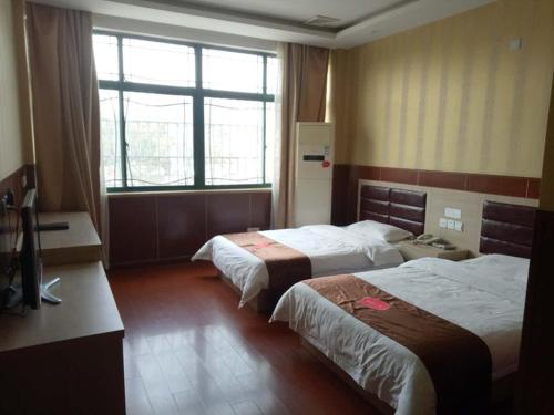 Φωτογραφία από το άλμπουμ του Thank Inn Chain Hotel hubei wuhan caidian district lianhua lake avenue στο Γουχάν