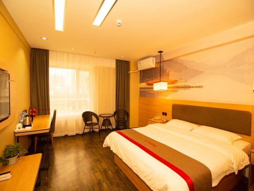 Krevet ili kreveti u jedinici u objektu Thank Inn Plus Hotel hebei hengshui taocheng district people's west road