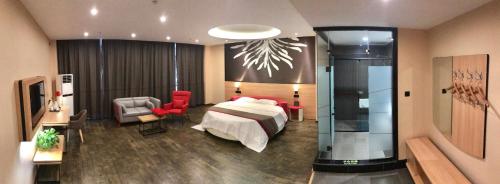 Ένα ή περισσότερα κρεβάτια σε δωμάτιο στο Thank Inn Chain Hotel hebei handan yongnian district development road