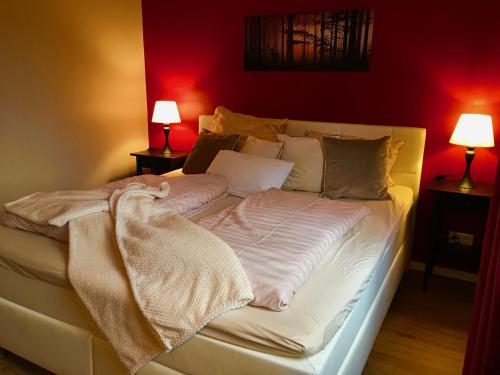 En eller flere senge i et værelse på Ferienwohnung Gute Zeit Hahnenklee