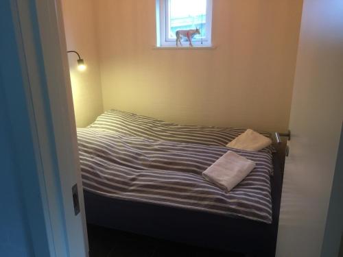 Postel nebo postele na pokoji v ubytování Skagen anneks
