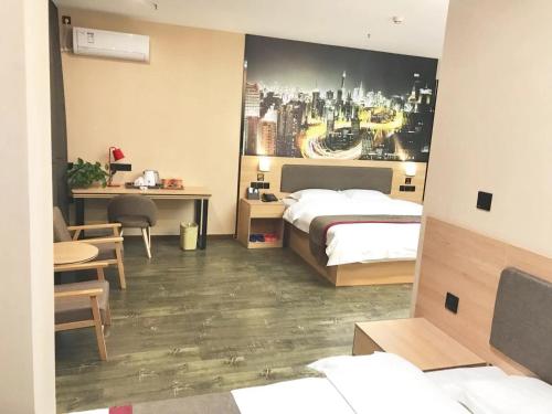 Ένα ή περισσότερα κρεβάτια σε δωμάτιο στο Thank Inn Chain Hotel hebei handan yongnian district development road