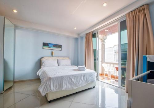 Ένα ή περισσότερα κρεβάτια σε δωμάτιο στο Akvavit Living