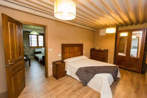 Postel nebo postele na pokoji v ubytování Apartamentos Casa Mateo