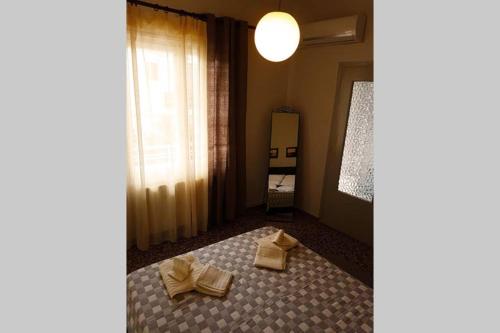 Posteľ alebo postele v izbe v ubytovaní Ellis Apartments , Amperia , Crete