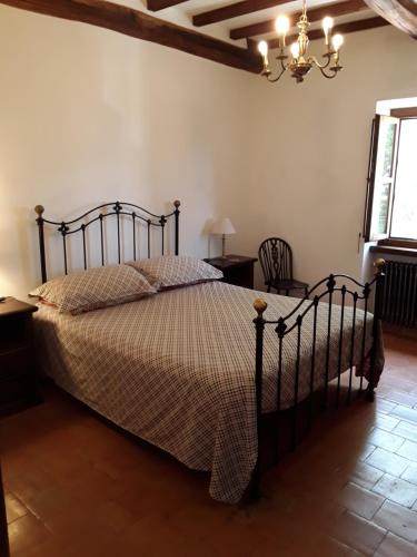 Кровать или кровати в номере LaPorcilaia
