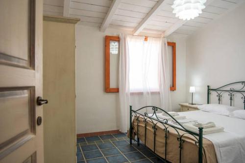 Postel nebo postele na pokoji v ubytování Agriturismo Agrimaccari Marzamemi-Vendicari - Esperienza autentica siciliana