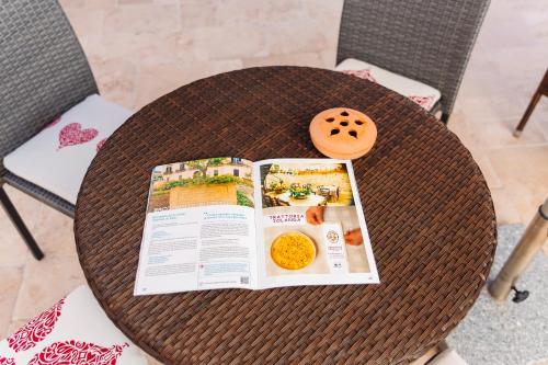 a book sitting on top of a table at Iolanda Vacanze in Lucugnano