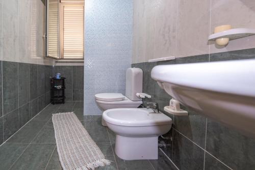 Kúpeľňa v ubytovaní Fontane Bianche Villa Jole