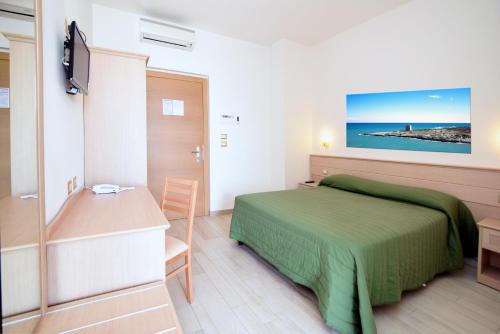 Postel nebo postele na pokoji v ubytování Hotel Incanto