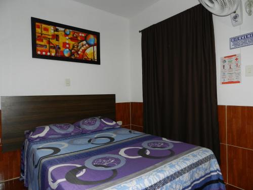 Postel nebo postele na pokoji v ubytování Hotel Sucre Del Bosque