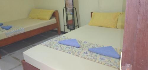 Katil atau katil-katil dalam bilik di Xylla Guesthouse