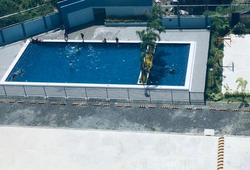 an overhead view of a swimming pool at BH Mangrove Condos in Mactan