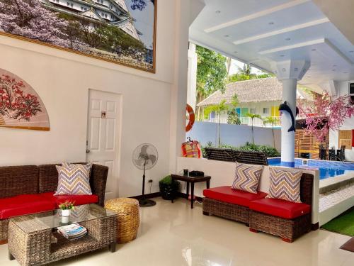 Postel nebo postele na pokoji v ubytování IL Mare Sakura Resort Boracay