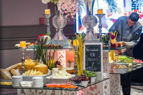 a buffet of food on a table in a store at Intercontinental Miramar Panama by IHG in Panama City