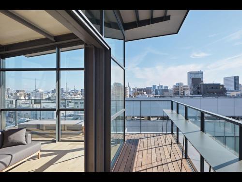 a balcony of a building with a view of the city at 9h nine hours Nagoya station in Nagoya
