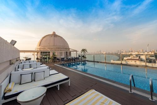 a pool on the roof of a building at InterContinental Marine Drive Mumbai by IHG in Mumbai