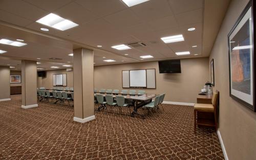 a conference room with a long table and chairs at Staybridge Suites Baltimore - Inner Harbor by IHG in Baltimore