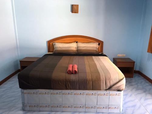 Una cama o camas en una habitación de M.P Resort