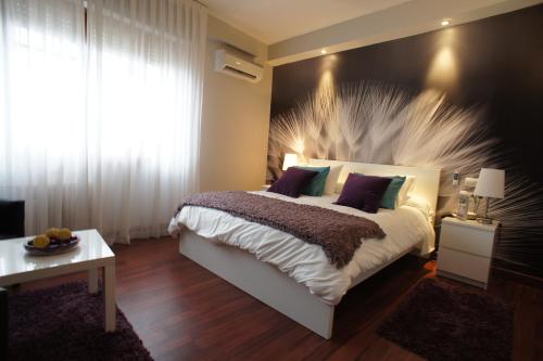 Ένα ή περισσότερα κρεβάτια σε δωμάτιο στο Hotel Montermoso