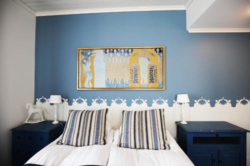 Postel nebo postele na pokoji v ubytování Boutique Hotel Yöpuu