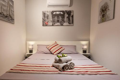 Llit o llits en una habitació de Valletta Collection - GB Duplex